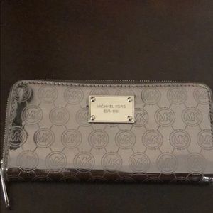 Authentic never used Michael kors silver wallet